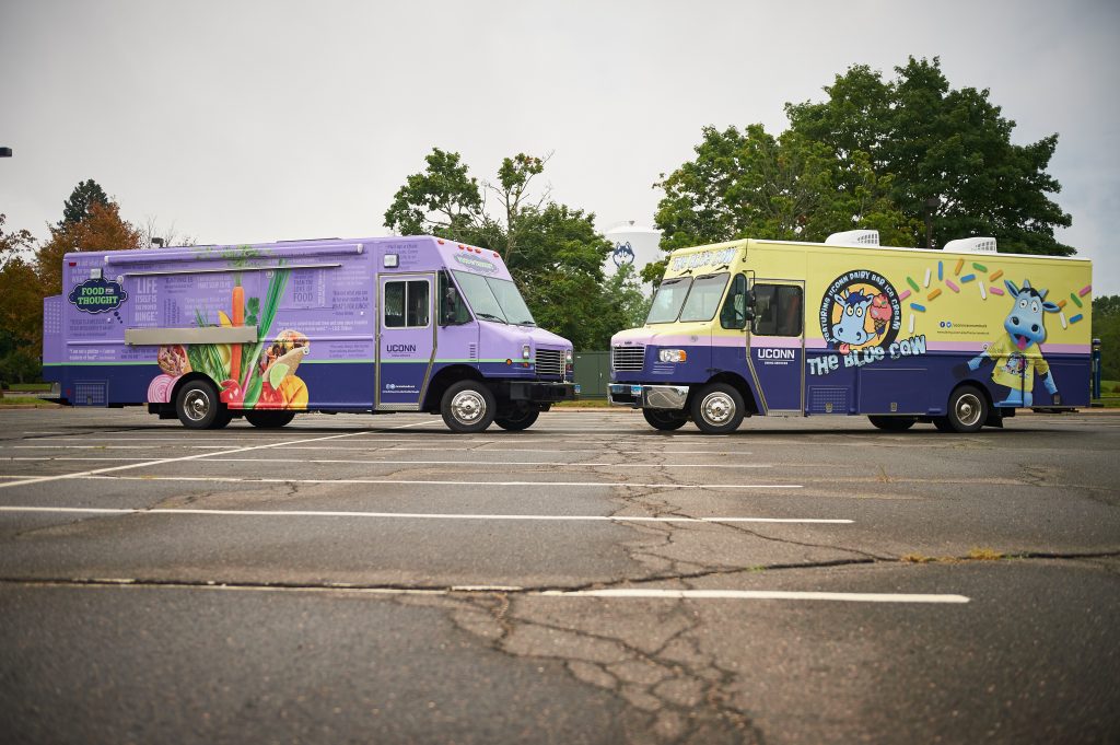 The Blue Cow II and Food for Thought trucks on Aug. 21, 2015. (Peter Morenus/UConn Photo)